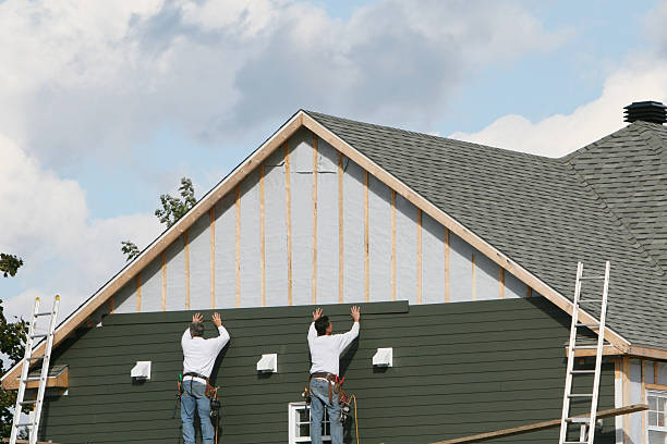 Professional Siding Installation technician working in Jordan, NY